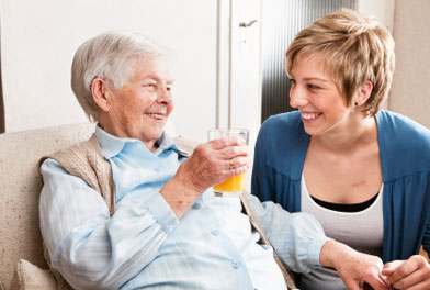 image of elderly woman with health care assistant