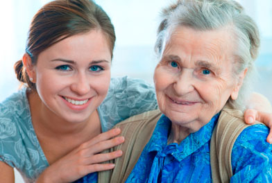 image of elderly woman with health care assistant